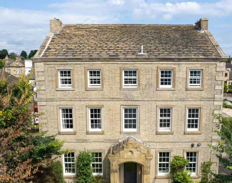 Stone period house fitted with sliding sashes – Roundhay Windows And Doors