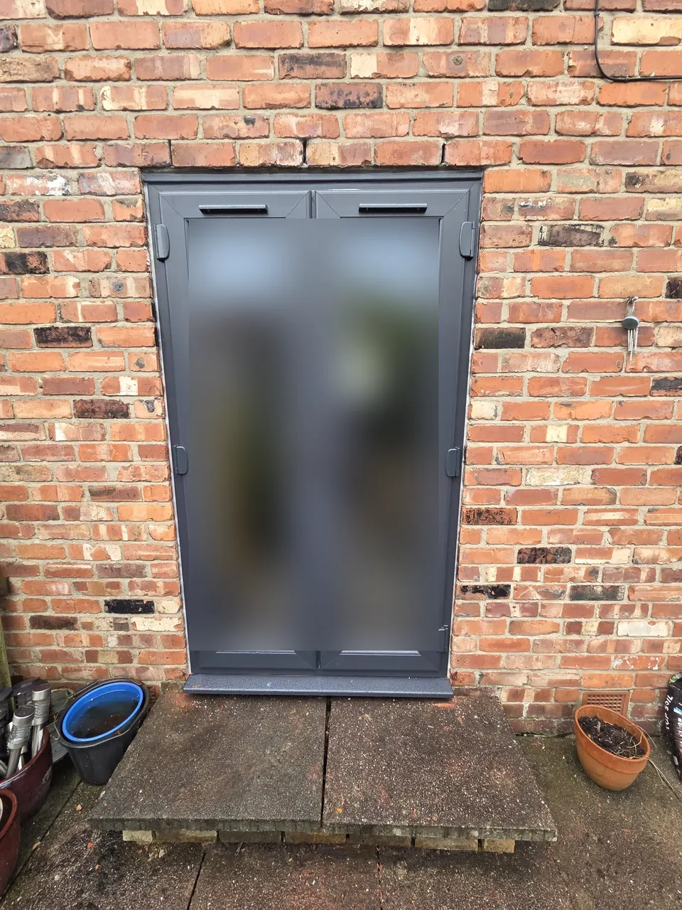 After: new anthracite grey uPVC French doors fitted in Alwoodley, Leeds